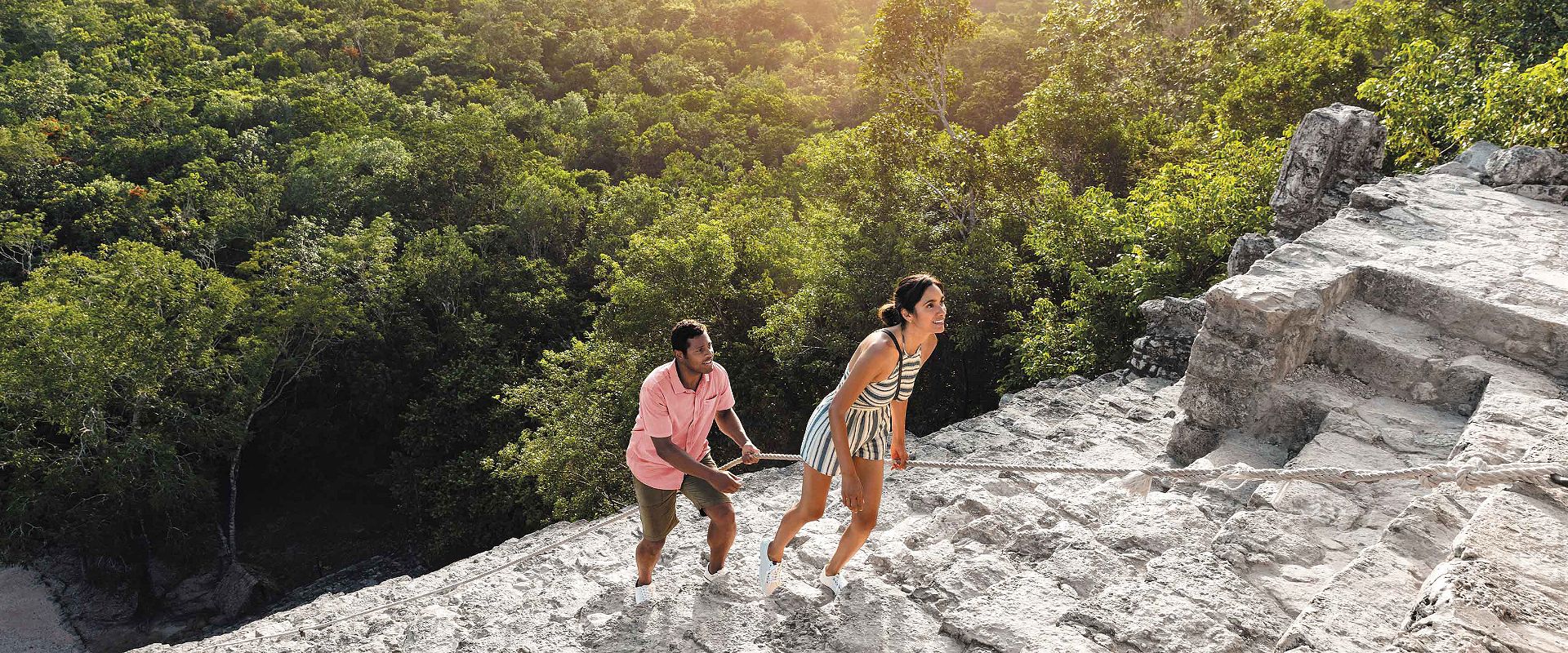 cozumel-mexico-ruins-couple-climbing-up.jpeg