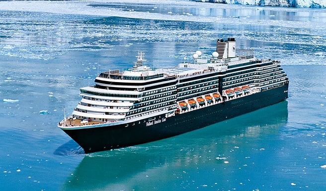 Cruise Ship in Arctic Glacial Waters A large black and white cruise ship sailing through icy blue waters with glacial landscape in the background, surrounded by floating ice fragments.