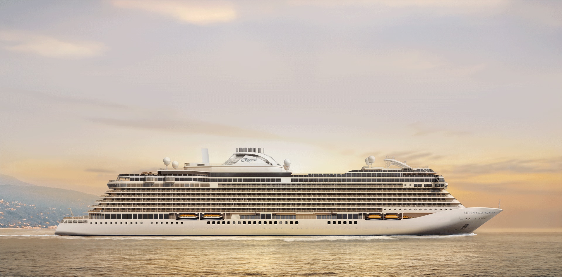 A large white cruise ship sailing on calm waters during a golden sunset, with mountains visible in the distant background. The vessel appears sleek and modern, with multiple decks and distinctive design.