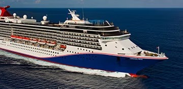 Carnival Pride Cruise Ship at Sea A large modern cruise ship operated by Carnival Cruise Lines sailing on open ocean waters
